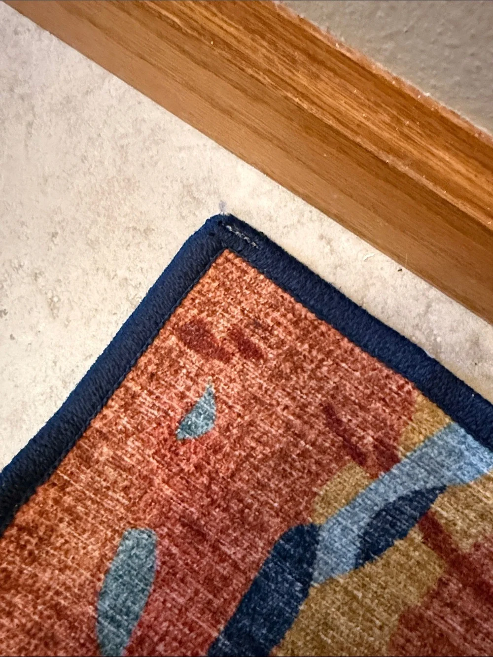 Ruggable flat woven watercolor floral rug in Navy and Coral. Cover only